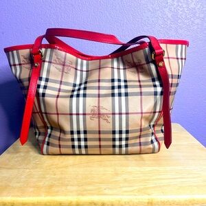Beautiful Burberry Canterbury tote with orange trim. Pouchette included!!!